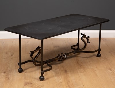 Lot 343 - A wrought iron and black slate topped...