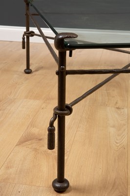 Lot 428 - A wrought iron glass topped occasional table...