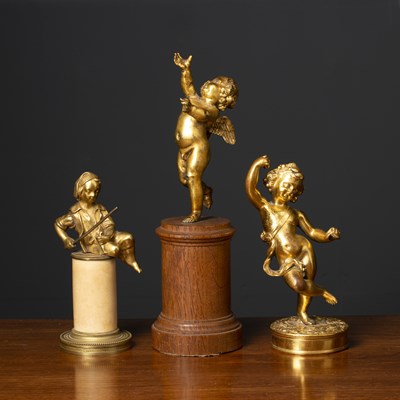 Lot 340 - A gilt bronze sculpture of a cherub later...