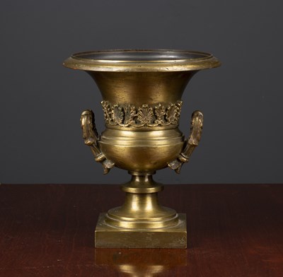 Lot 431 - A gilt brass urn of campana form, with foliate...