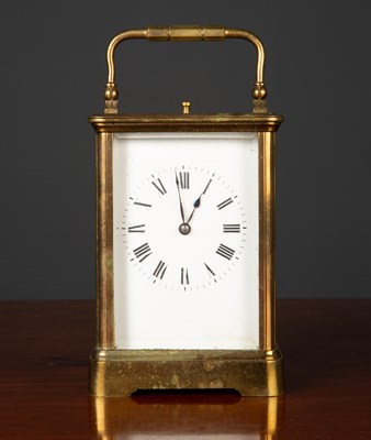 Lot 317 - A late 19th century French carriage clock with...