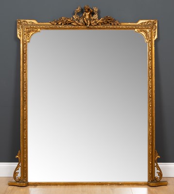 Lot 324 - A 19th century gilded overmantle mirror with a...