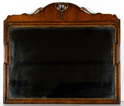 Lot 325 - An antique walnut framed wall mirror 77cm wide...