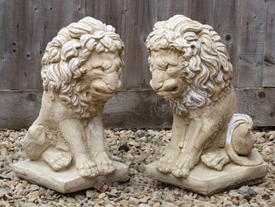 Lot 789 - A pair of cast reconstituted stone seated...