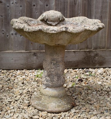 Lot 791 - A shell moulded cast reconstituted stone bird...