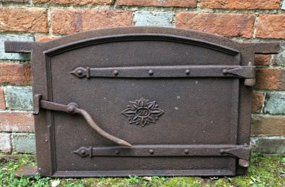 Lot 800 - A 19th century cast iron bread oven door and...