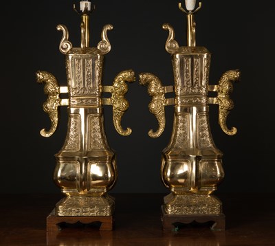 Lot 464 - A brass Chinese style table lamps of archaic...