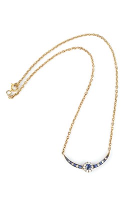 Lot 188 - A sapphire and diamond pendant necklace,...