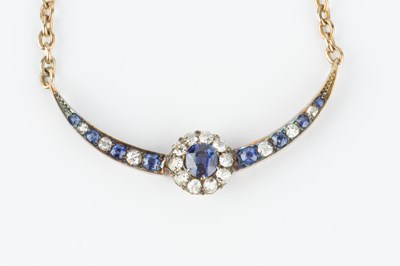 Lot 188 - A sapphire and diamond pendant necklace,...
