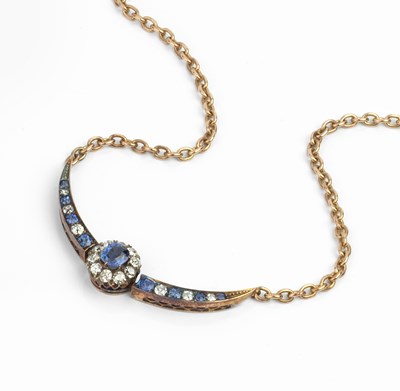 Lot 188 - A sapphire and diamond pendant necklace,...