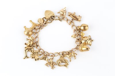 Lot 15 - A 9ct gold bracelet, the curb-link bracelet...