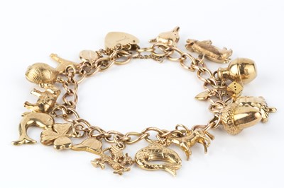 Lot 15 - A 9ct gold bracelet, the curb-link bracelet...