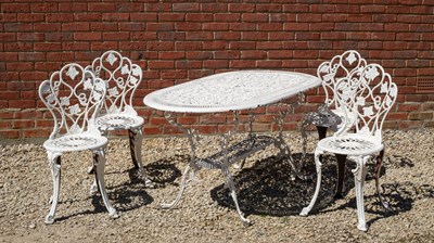 Lot 844 - A white painted cast aluminium garden dining...