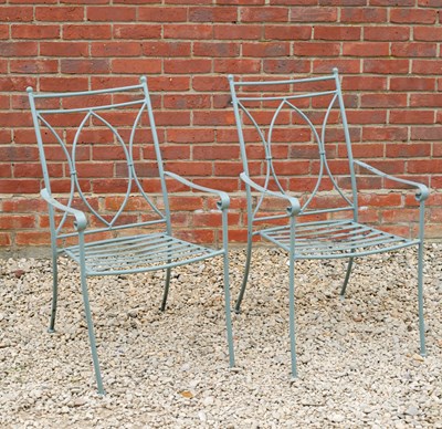 Lot 878 - A pair of green painted wrought iron garden...