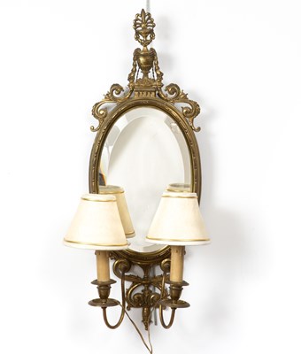 Lot 532 - An Adam style brass girandole wall mirror with...