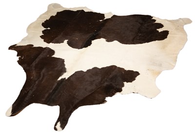 Lot 78 - A modern black and white cow hide rug 193cm x...