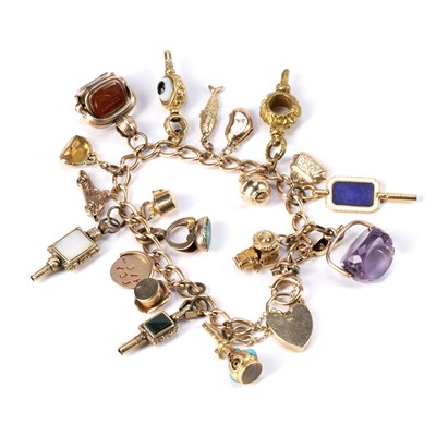 Lot 466 - Victorian 15ct gold charm bracelet each link...