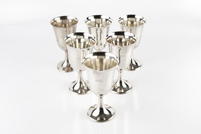 Lot 819 - A set of six American silver goblets, each...