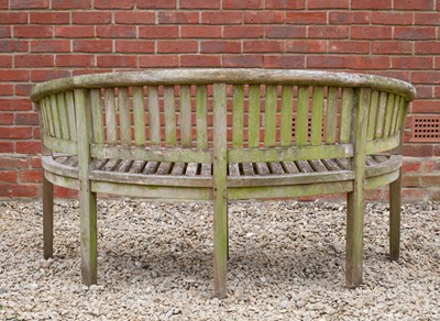 Lot 881 - A garden bench with serpentine front and...