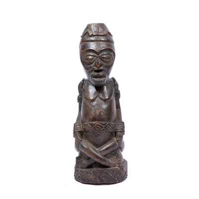 Lot 587 - A Kuba King figure, carved wood statuette with...