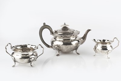 Lot 827 - An Edwardian silver three piece tea service,...