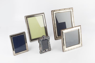 Lot 828 - A silver rectangular photograph frame, with...