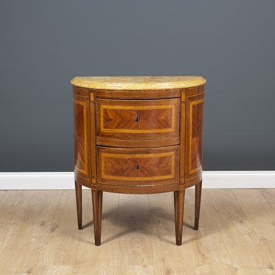 Lot 517 - A continental D shaped marble topped walnut...