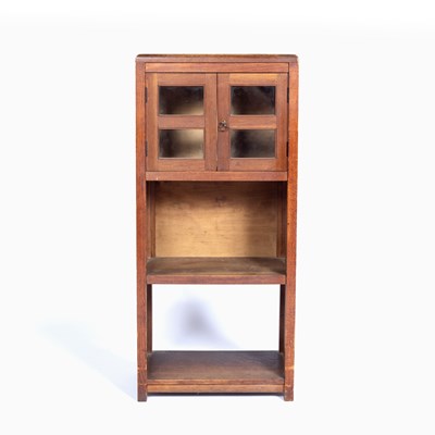 Lot 59 - Cotswold School oak side cabinet with glazed...