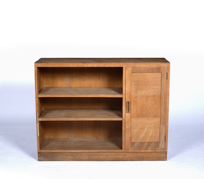 Lot 75 - In the manner of Heals oak bookcase with three...