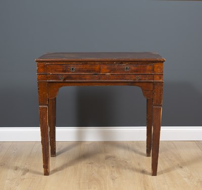 Lot 521 - A continental walnut side table with three...