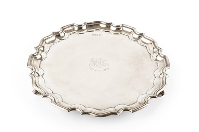 Lot 835 - A silver salver, with piecrust border, on...