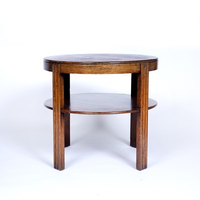 Lot 107 - 1930's Oak circular table with under tier...