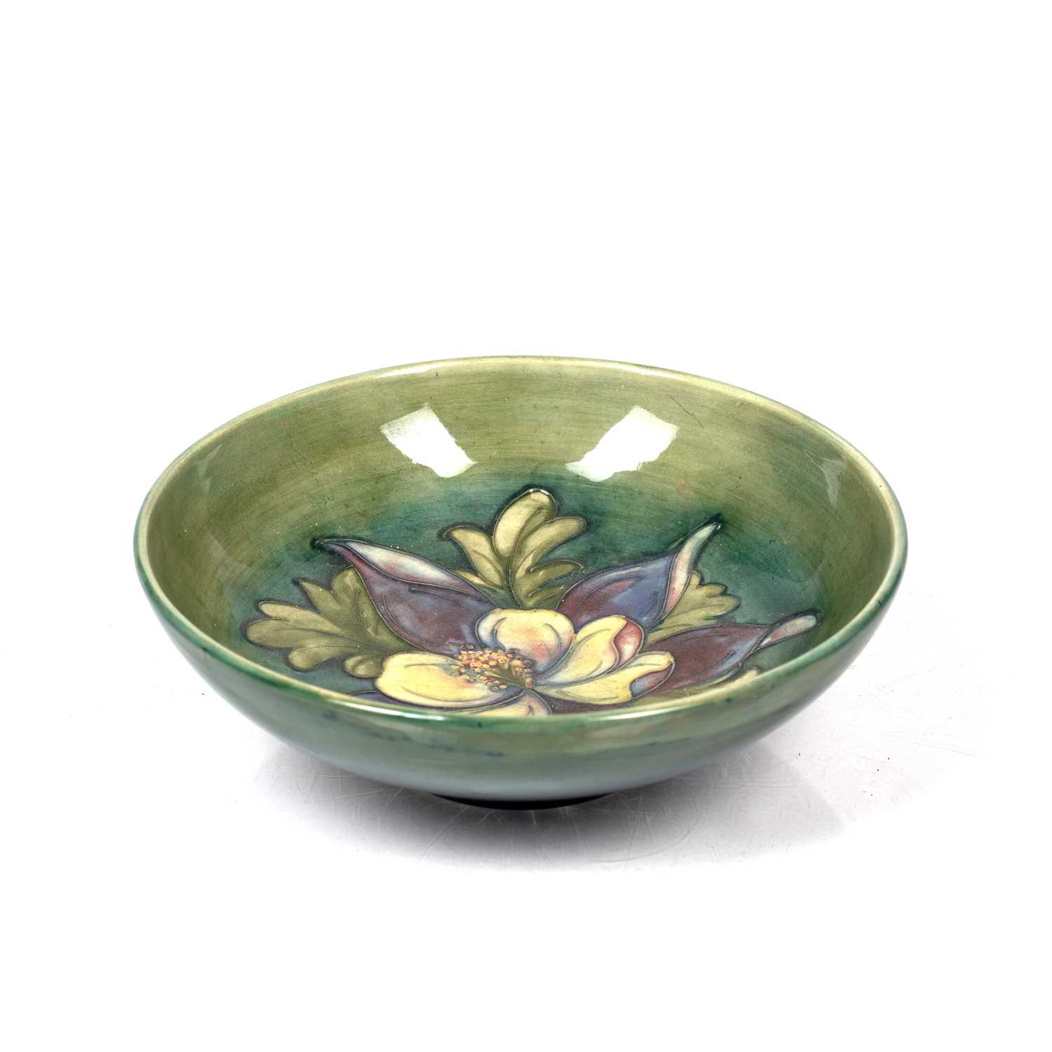 Lot 390 - Moorcroft pottery 'Columbine' pattern bowl on...