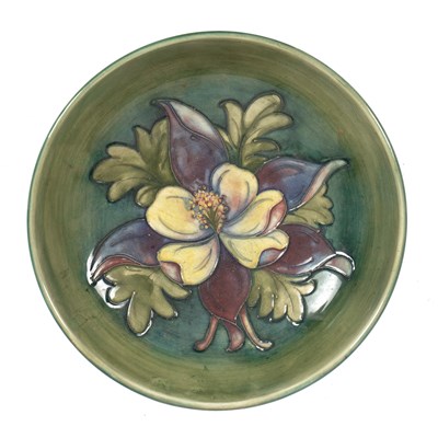 Lot 390 - Moorcroft pottery 'Columbine' pattern bowl on...