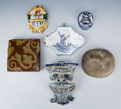 Lot 290 - Two Delft blue and white glazed wall...