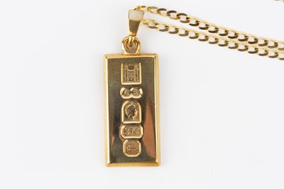 Lot 52 - A 9ct gold ingot pendant, suspended from a 9ct...