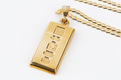 Lot 52 - A 9ct gold ingot pendant, suspended from a 9ct...