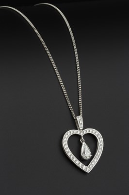 Lot 178 - A diamond pendant on chain, the openwork heart-...