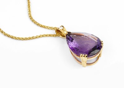 Lot 267 - An amethyst and diamond set pendant, the...