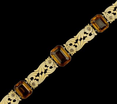 Lot 729 - Bernard Instone (1891-1987) Yellow enamel and...