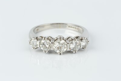 Lot 230 - A diamond five stone ring, the graduated round...