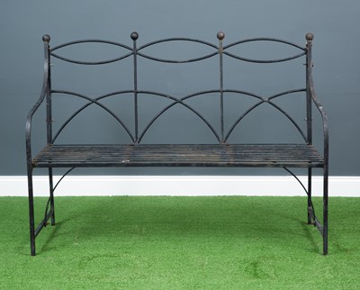 Lot 503 - A three-seater black painted metal garden...