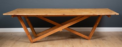 Lot 389 - A contemporary pine dining table, the five...