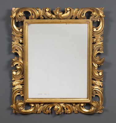 Lot 168 - An Italian gilded and carved wooden framed...