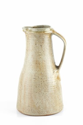 Lot 665 - Phil Rogers (1951-2020) Tall jug oatmeal glaze...