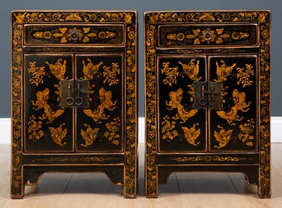 Lot 167 - A pair of Oriental black lacquered bedside...