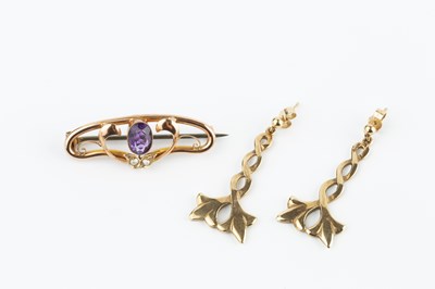 Lot 94 - An amethyst and half pearl set panel brooch,...