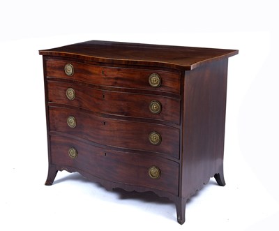 Lot 7 - A George III serpentine fronted mahogany chest,...