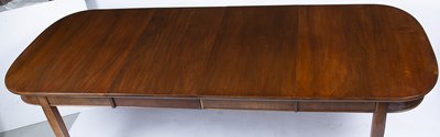 Lot 29 - An early 20th century extending 'D' end dining...