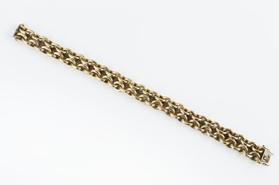 Lot 14 - 9ct gold fancy-link bracelet, the double row...